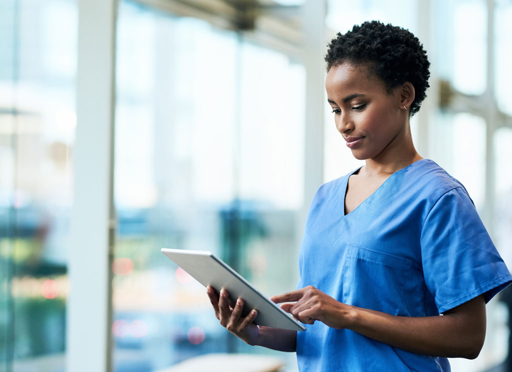 nurse using tablet