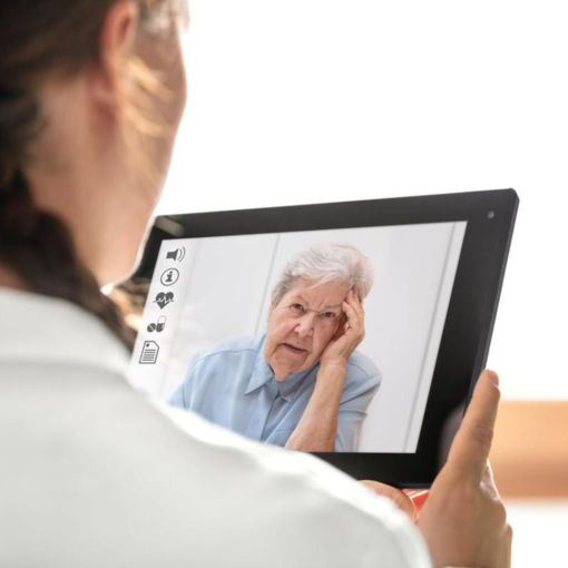 Senior woman talking to doctor virtually.